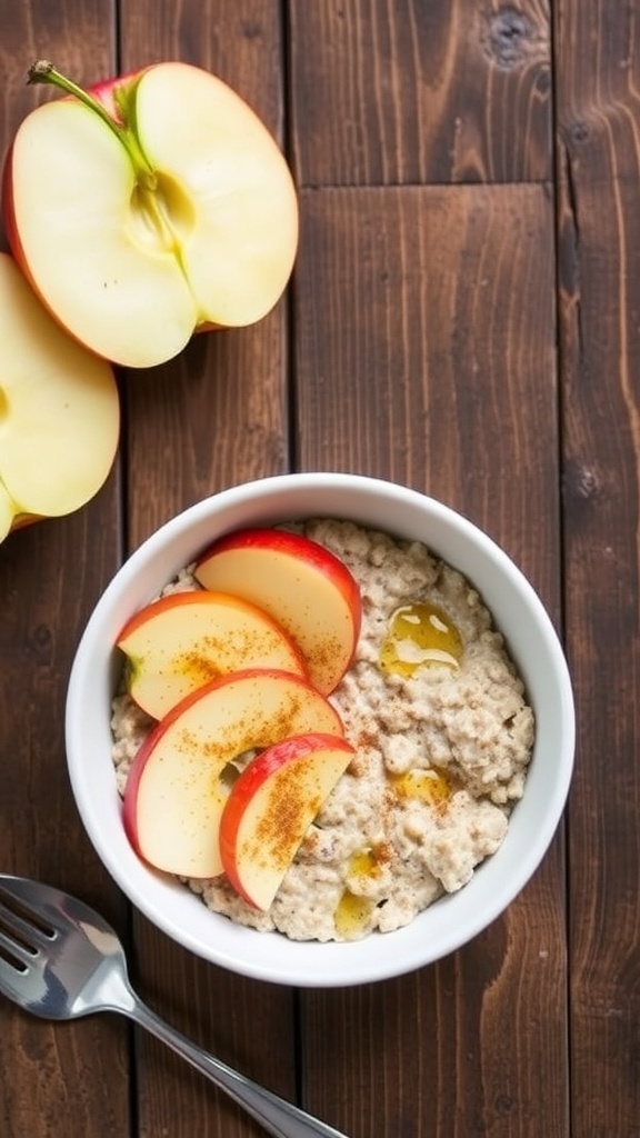 A bowl of apple cinnamon high protein overnight oats topped with apple slices and cinnamon, with whole apples beside it.